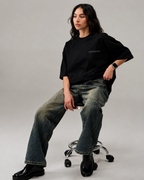 Streetwear silhouette of ARTEFACT Série 01 oversized black t-shirt